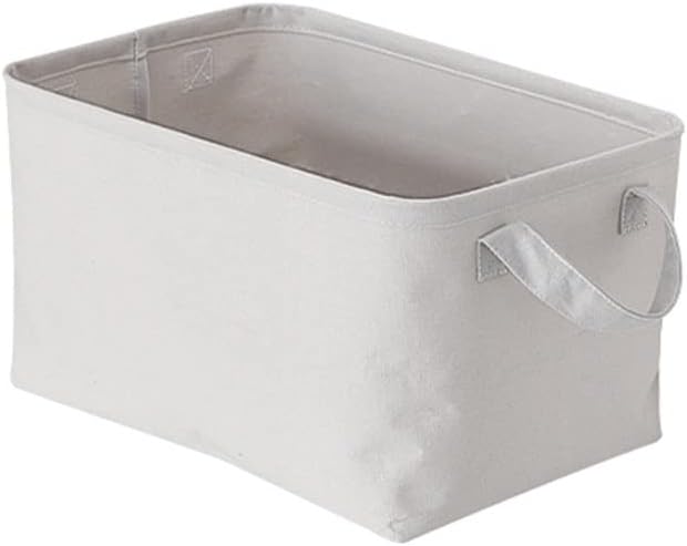 Ce panier a linge se presente en coloris gris